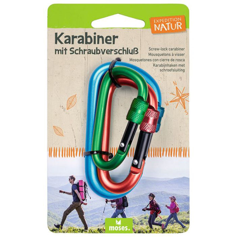 Verpackung „Expedition Natur“ mit drei Karabinern in den Farben grün, rot und blau, auf Karte mit Wanderern im Hintergrund.