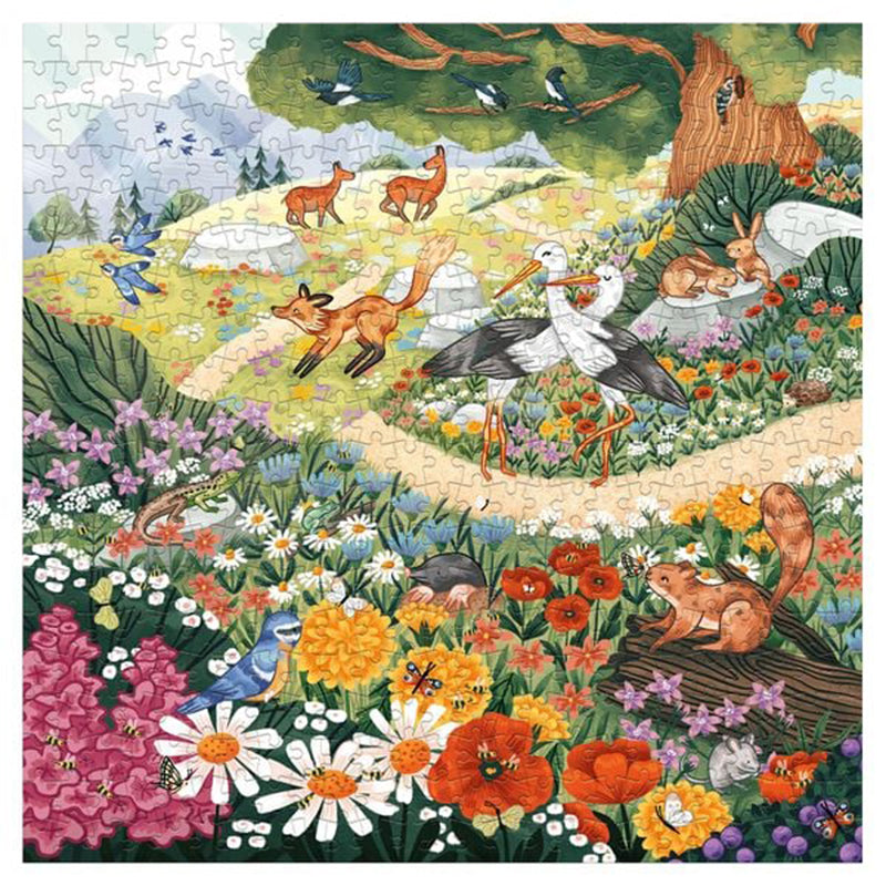 Abbildung des fertig zusammengesetzten Puzzles mit 500 Teilen: eine bunte Blumenwiese voller Tiere wie Füchse, Störche, Rehe, Eichhörnchen, Vögel und Insekten.