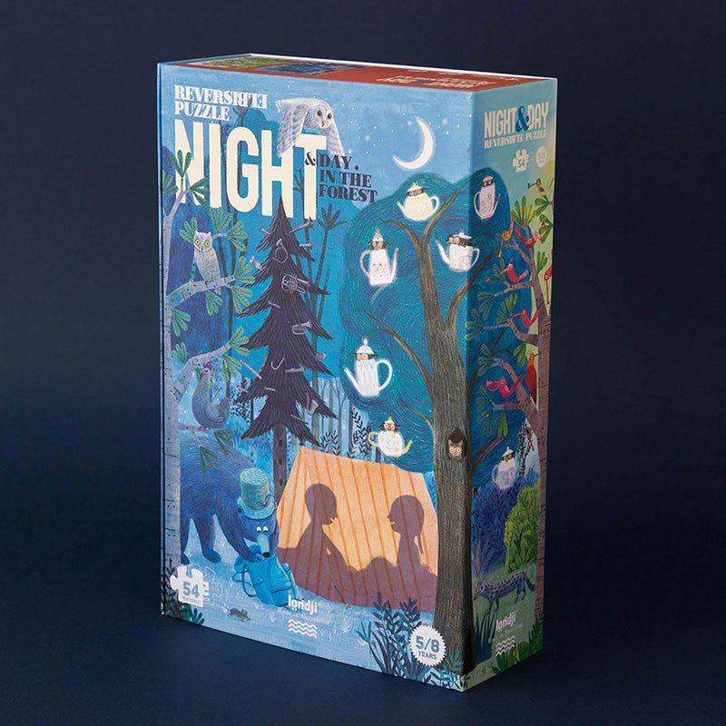 Schachtel des Puzzles „Night & Day in the Forest“ mit Waldmotiv bei Nacht, Tieren und Zelt.