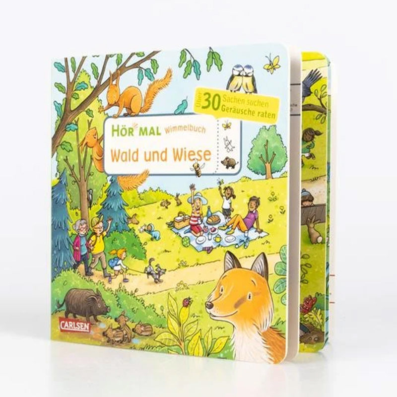 Produktfoto des Hör mal Wimmelbuchs "Wald und Wiese" leicht aufgeklappt von schräg vorne.