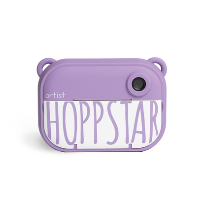 Hoppstar Artist Kinderkamera Blossom in lila – kreative Sofortbildkamera für kleine Fotografen, erhältlich im Waldpark Hochreiter Shop.