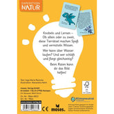 Rückseite der Kartenbox „Expedition Natur“ mit Textbeschreibung des Spiels, zwei Beispielkarten und Verlagsinfos.