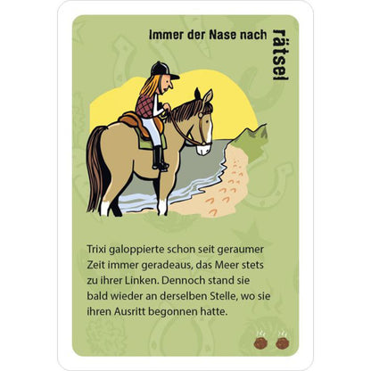 Spielkarte „Immer der Nase nach – Rätsel“ mit Illustration einer Reiterin am Strand, die auf einem Pferd sitzt.