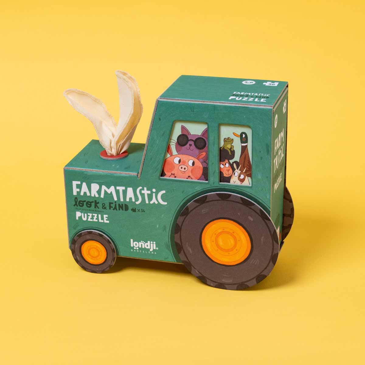 Traktorförmige Box des Farmtastic Kinderpuzzles in 3 D Ansicht