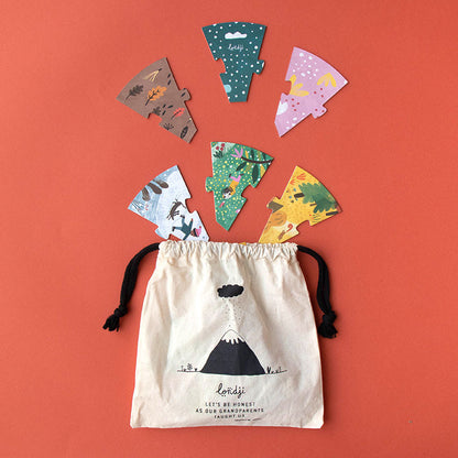 Inhalt des Puzzle A Home for Nature – FSC-Papier, Holz, Stoffbeutel und Karton