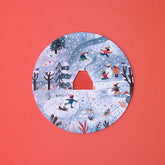 Puzzle Winter – Kinder spielen im Schnee vor Holzhütte