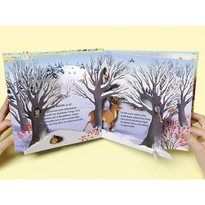 Winterseite mit Pop-up-Bäumen. Tiere suchen Schutz in Baumhöhlen und unter Schneedecken.