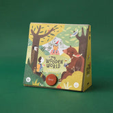 Verpackungsvorderseite mit Illustrationen von Kindern, Tieren und Bäumen im Wald.
