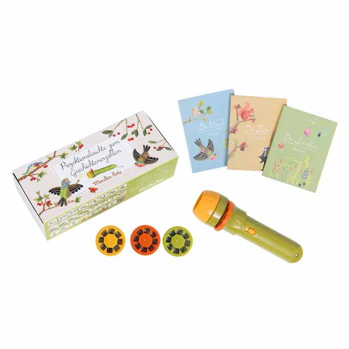 Projektionsleuchte jardin du moulin mit Verpackung und Lampe und drei Heftchen zum Mitschauen