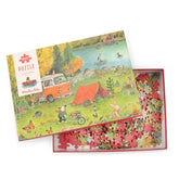 Offene Puzzle Schachtel in der die Puzzle Teile zu sehen sind