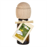 Braunes Glasfläschchen mit Holz-Duftkopf und Etikett Morgentau.