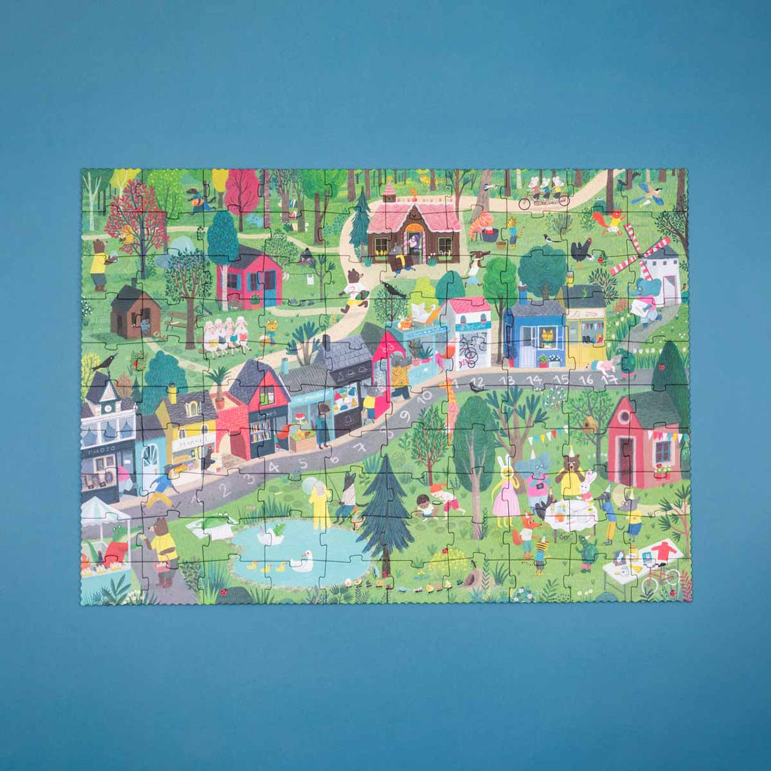 Fertig gelegtes Puzzle The Mysterious Case of the Birthday Cake mit Dorfszene
