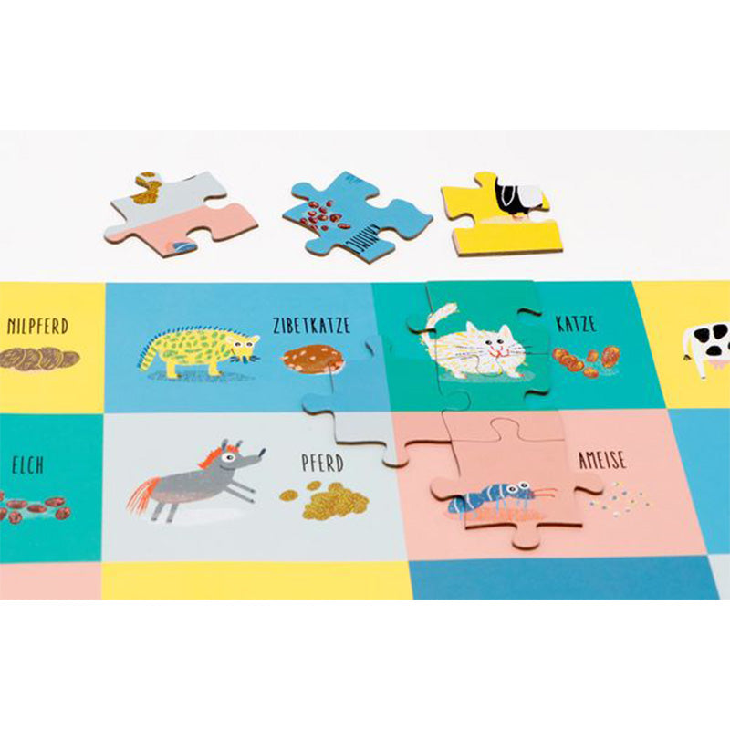Puzzleausschnitt im Aufbau: Katze, Pferd, Zibetkatze und Ameise mit passenden Kot-Illustrationen.