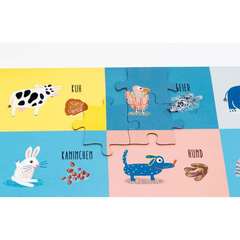 Puzzleausschnitt: Kuh, Kaninchen, Hund und Geier mit den passenden Kot-Illustrationen.