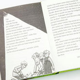 Buchseite: Schwarz-weiß-Illustration mehrerer Männer mit Schaufeln im Lichtschein, dazu Text – eine Szene, in der gegraben wird.