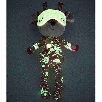 Leuchtendes Plüschreh im Dunkeln, Muster und Schlafmaske fluoreszieren