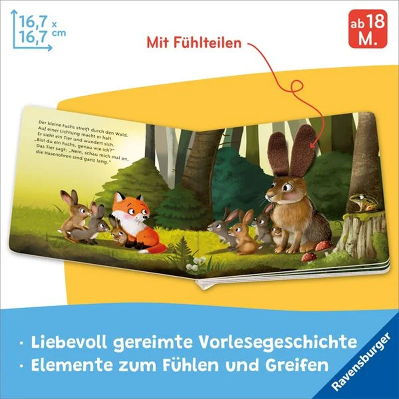 Buchseite mit Fuchs, Hasenfamilie und großer Fühlfläche an den Ohren des Hasen.