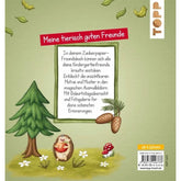 Rückseite des Buches mit grünem Hintergrund, Textfeld „Meine tierisch guten Freunde“, Baum, Igel mit Apfel und Tannenzapfen.