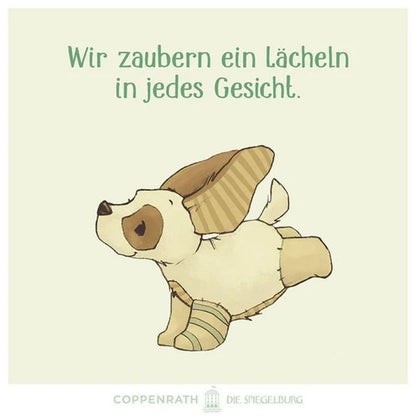 Produktmotiv – Hund als Illustration mit Text „Wir zaubern ein Lächeln in jedes Gesicht“