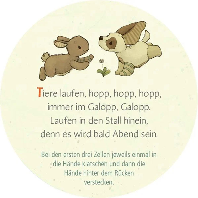 Kartenrückseite – Reimkarte mit Hase und Hund auf Wiese mit Bewegungstext