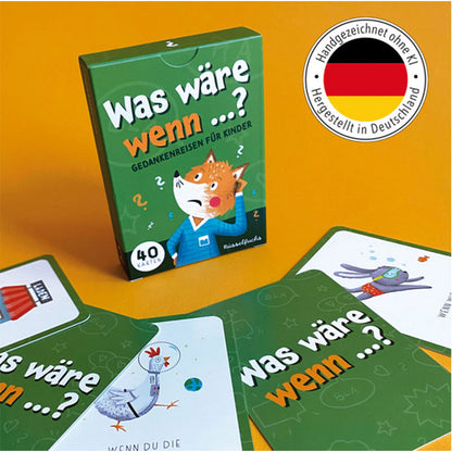 Produktfoto der Was wäre wenn Kartenbox mit ausgebreiteten Karten auf gelbem Hintergrund, handgezeichnete Illustrationen und Siegel für Herstellung in Deutschland